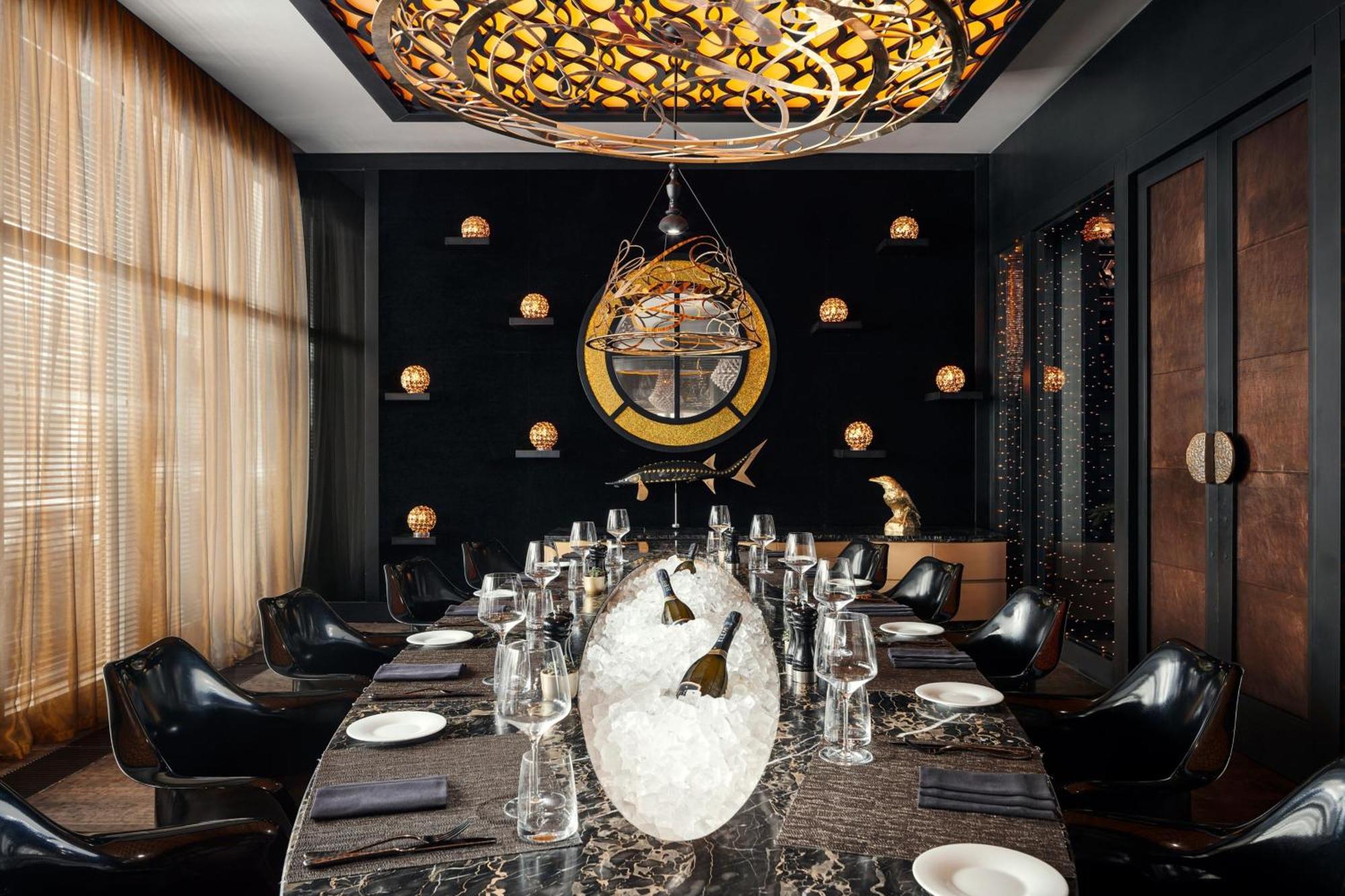 Jw 메리어트 압셰론 바쿠 호텔 외부 사진 The dining room at the restaurant